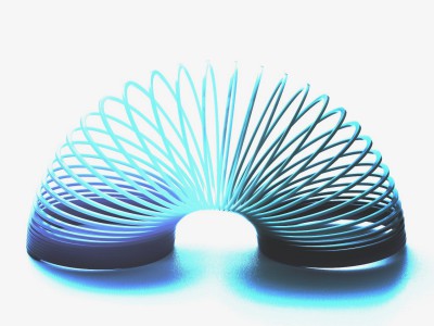 Rainbow coloured slinky toy