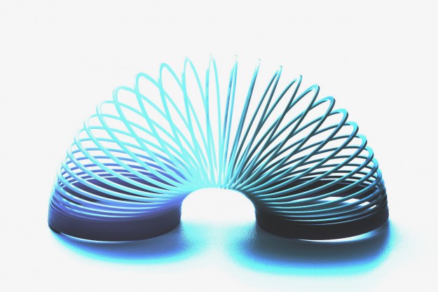 Rainbow coloured slinky toy